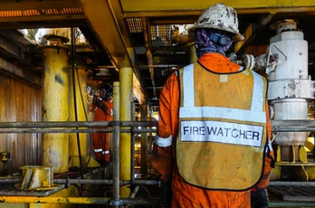 Firewatch guard monitoring industrial site in Central Oklahoma